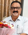 Dr. Tribikram Sarangi